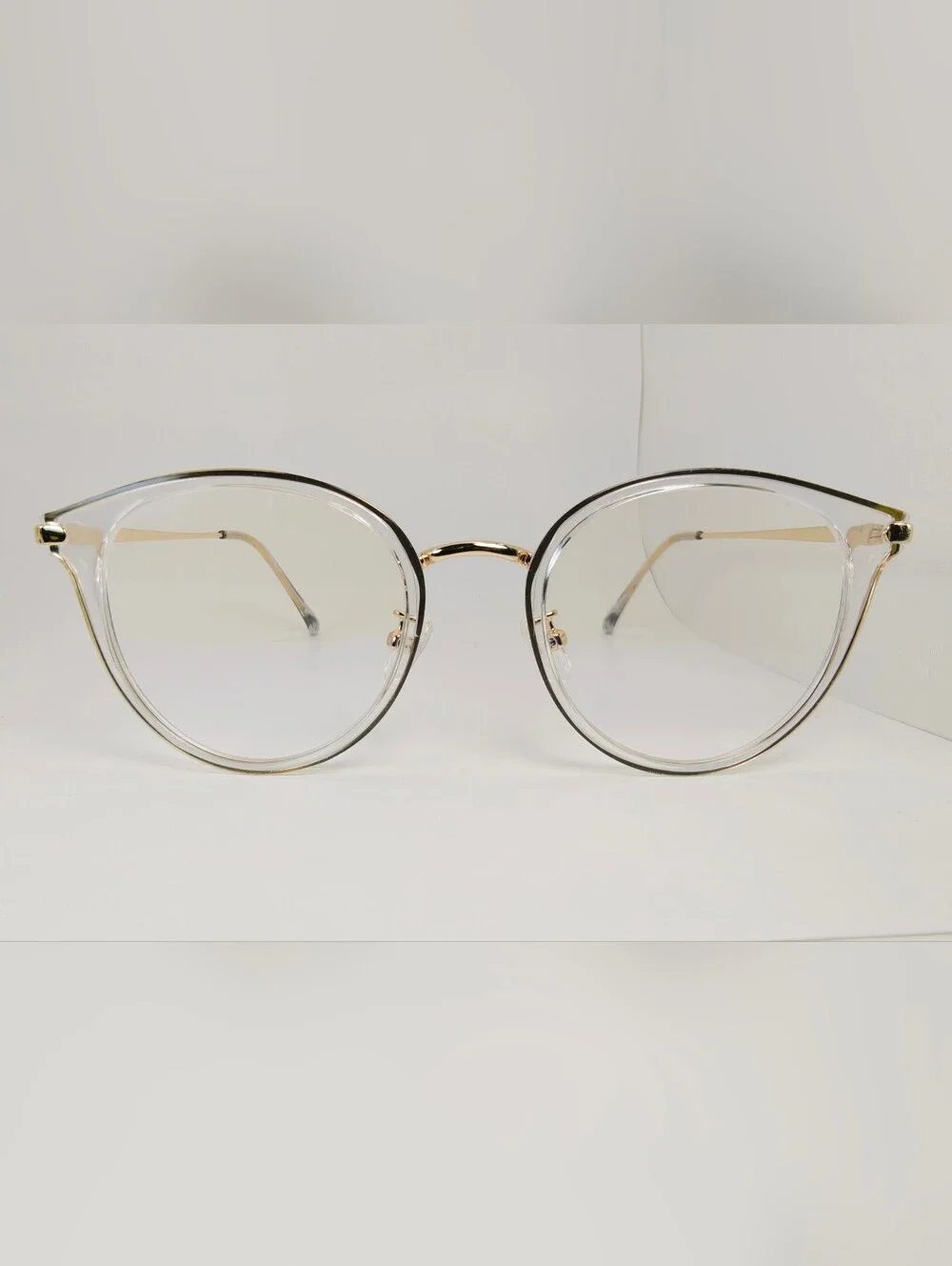 Hollie. Clear Gold. Metal And Acetate Frame.  Round Women's Eyeglasses